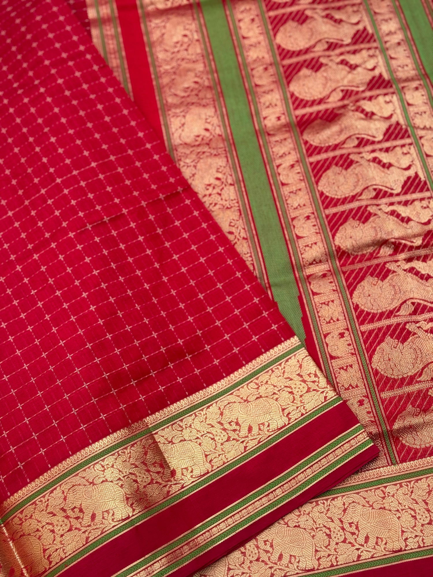 A gorgeous scarlet red shade handwoven plus buttas  silk cotton saree