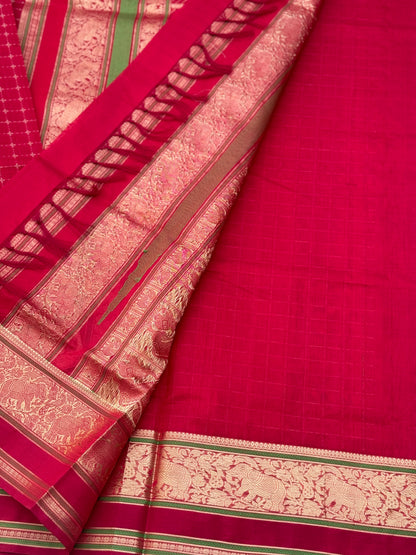 A gorgeous scarlet red shade handwoven plus buttas  silk cotton saree