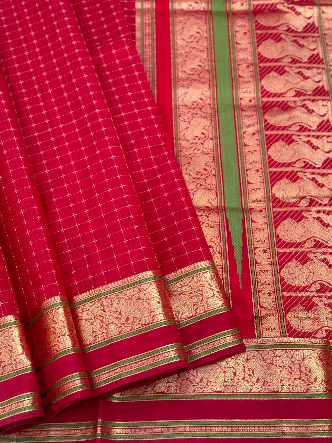 A gorgeous scarlet red shade handwoven plus buttas silk cotton saree