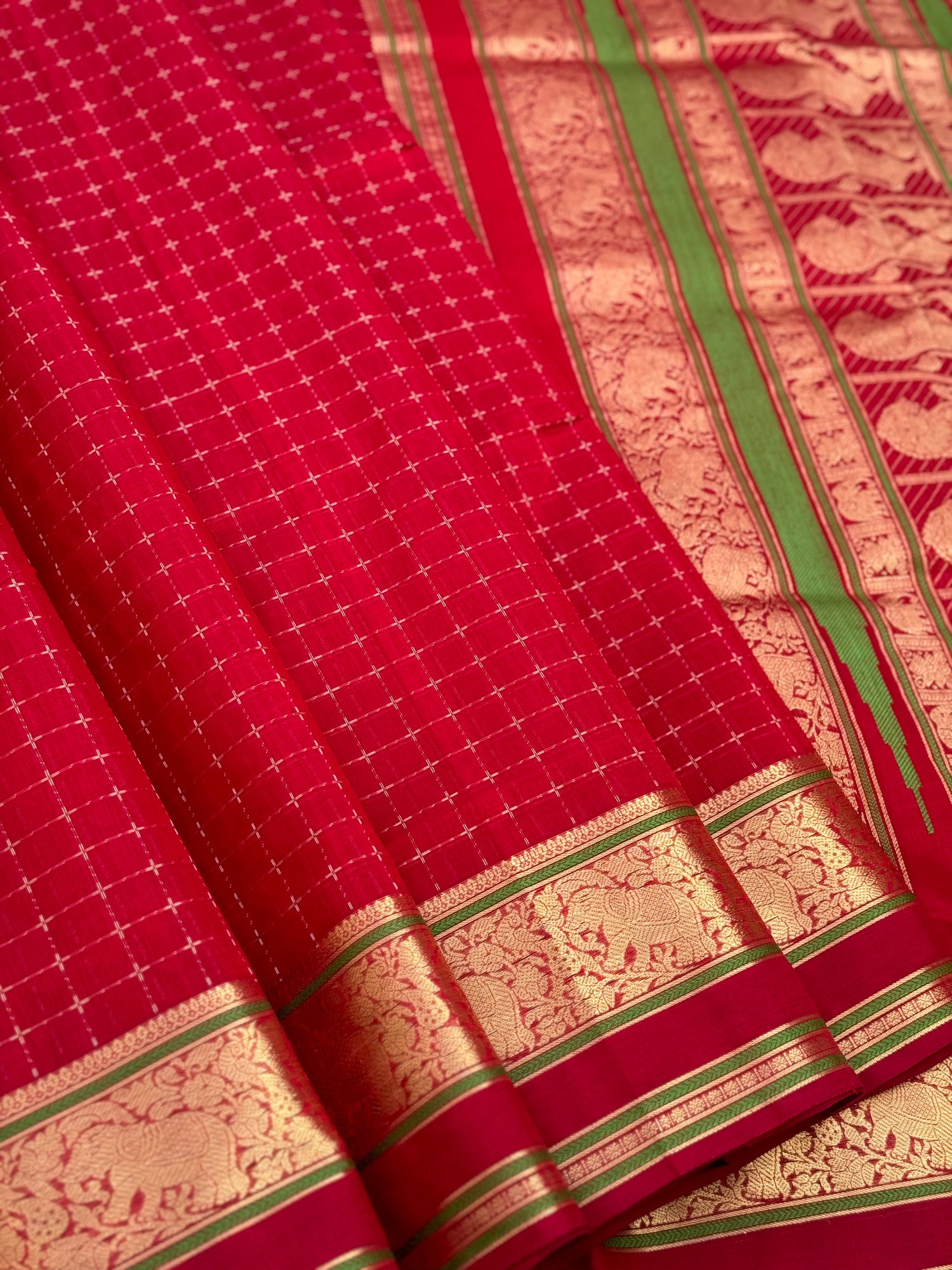 A gorgeous scarlet red shade handwoven plus buttas  silk cotton saree