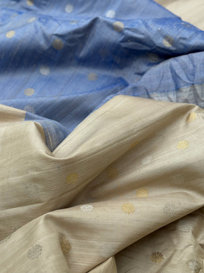 A gorgeous offwhite with powder blue temple border kuttu handwoven gadwal dupion raw silk saree