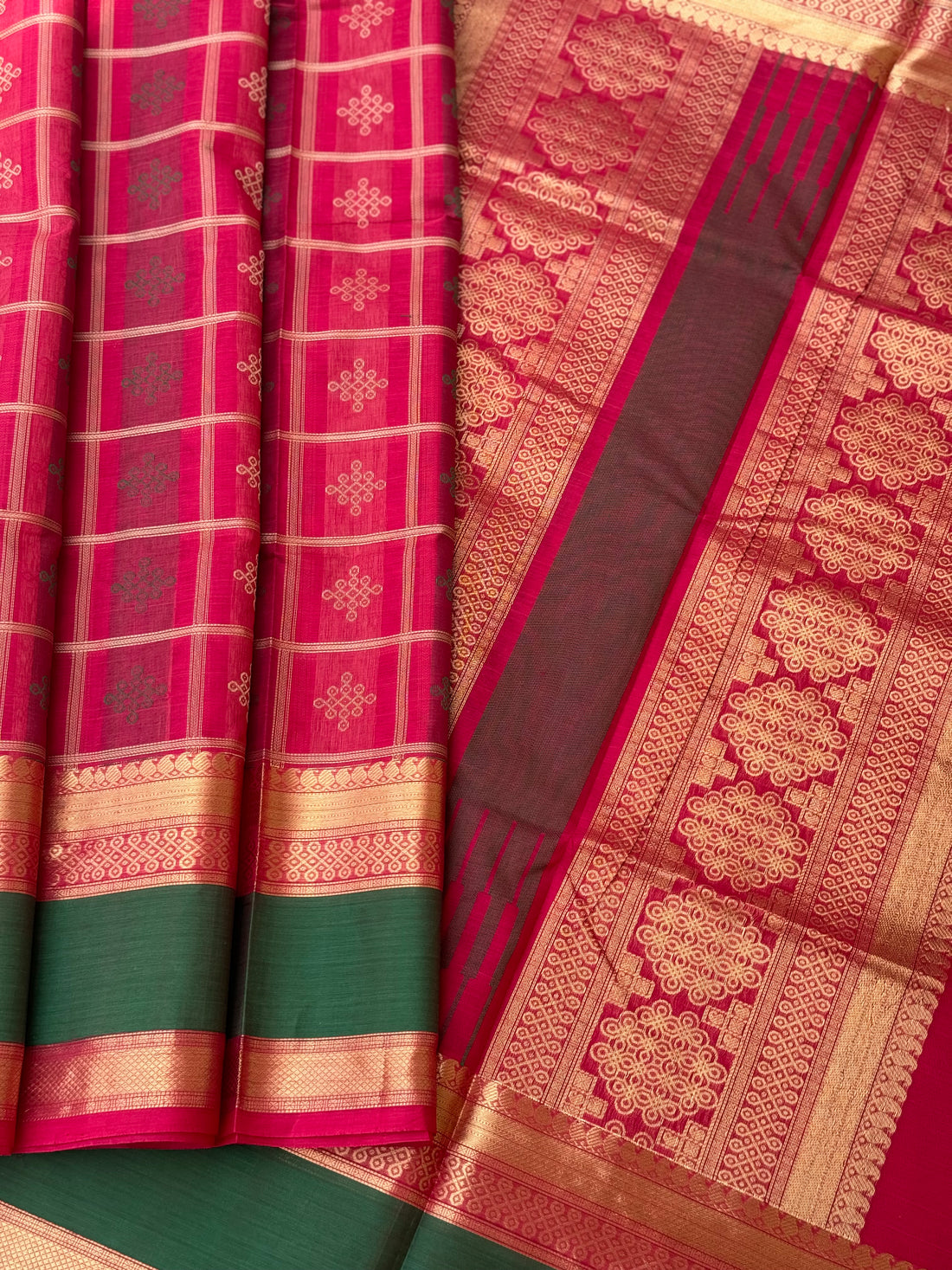 A gorgeous fuchsia pink shade handwoven kolam buttas silk cotton saree