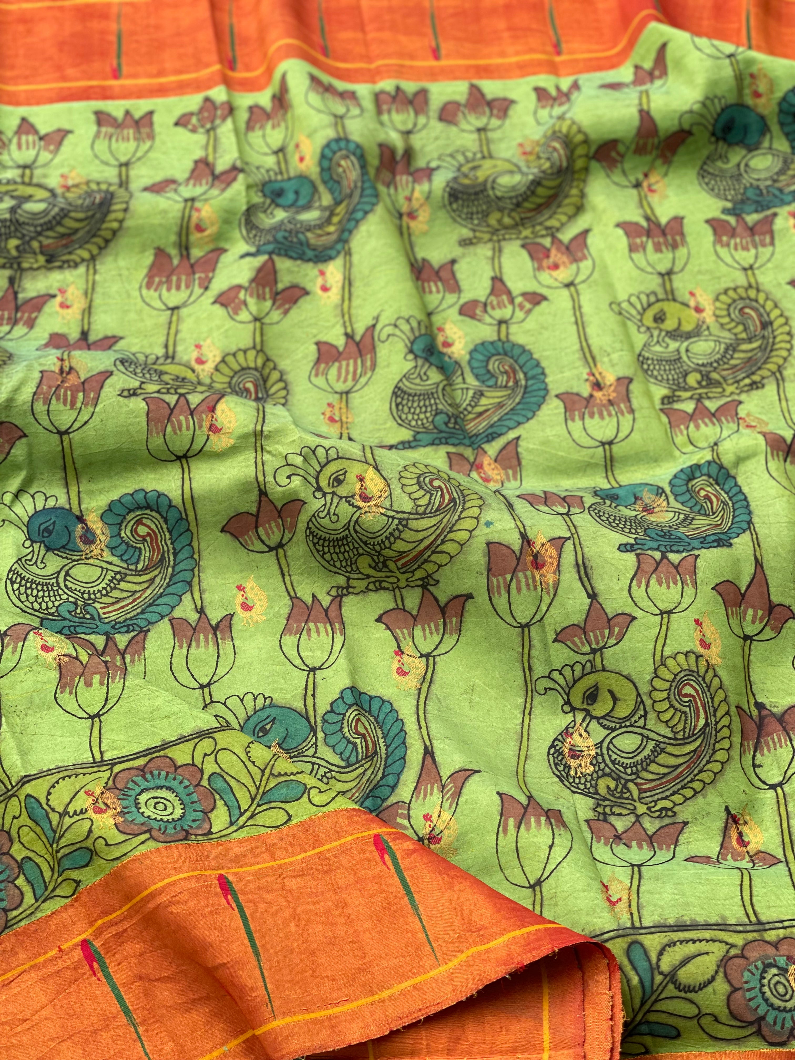 HandDrawn And HandPainted Penkalamkari In pastel pista green Paithani Silk Saree