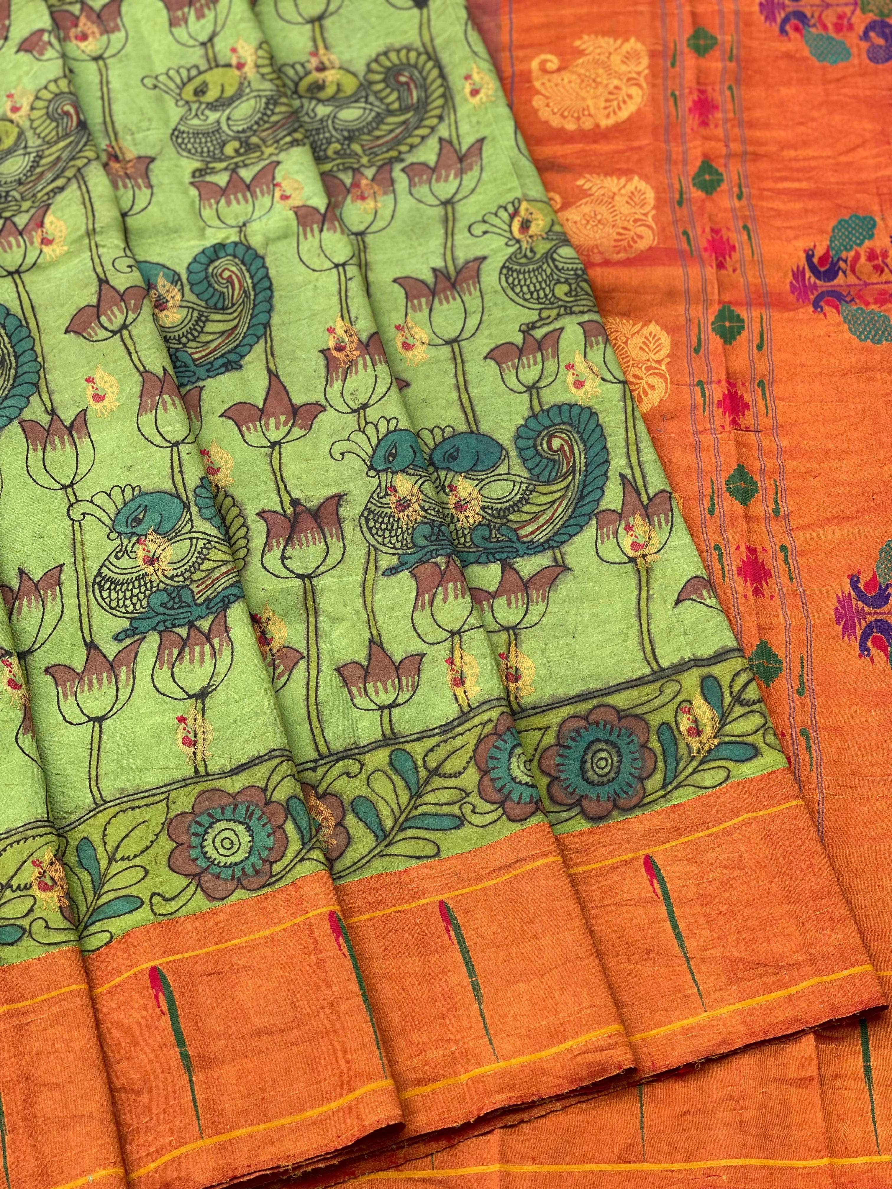 HandDrawn And HandPainted Penkalamkari In pastel pista green Paithani Silk Saree