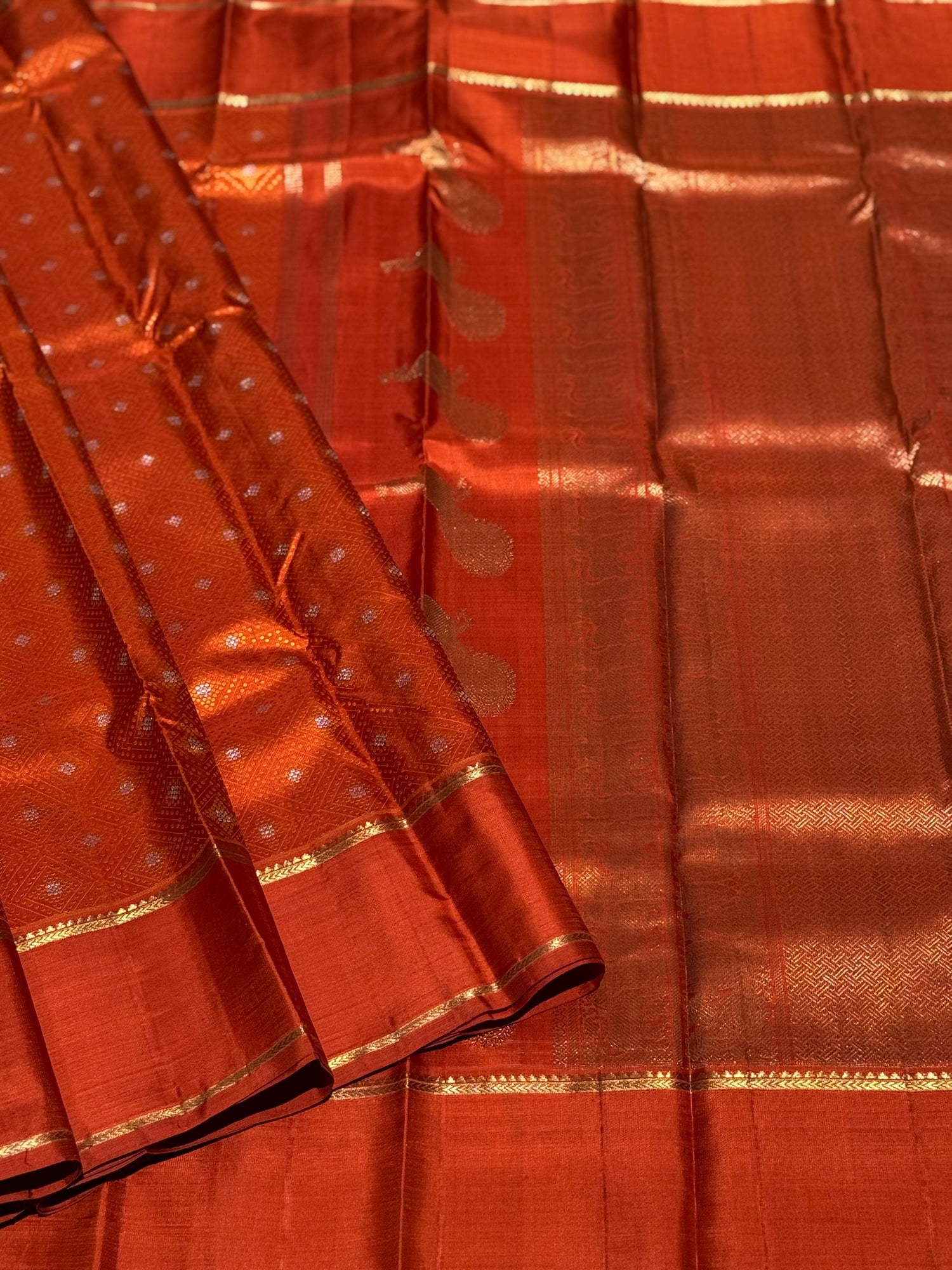 An awe inspiring masterpiece rustic orange shade bhandini inspired kanchivaram silk saree masterpiece