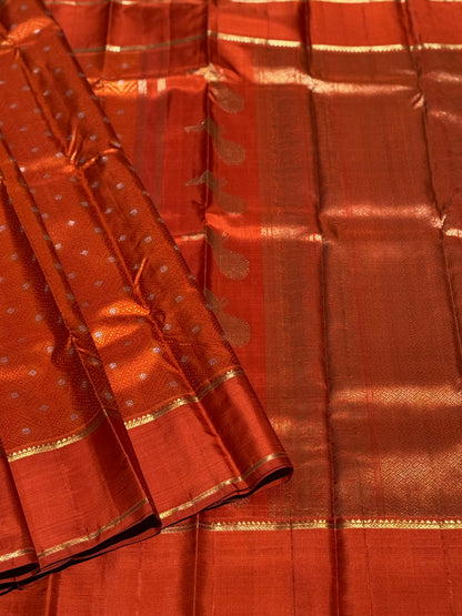 An awe inspiring masterpiece rustic orange shade bhandini inspired kanchivaram silk saree masterpiece