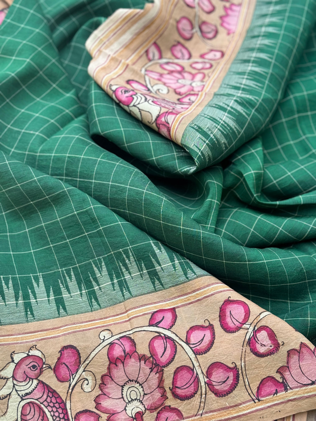 An elegant Handdrawn handpainted penkalamkari on Korvai kanchivaram silk saree withborder penkalamkari