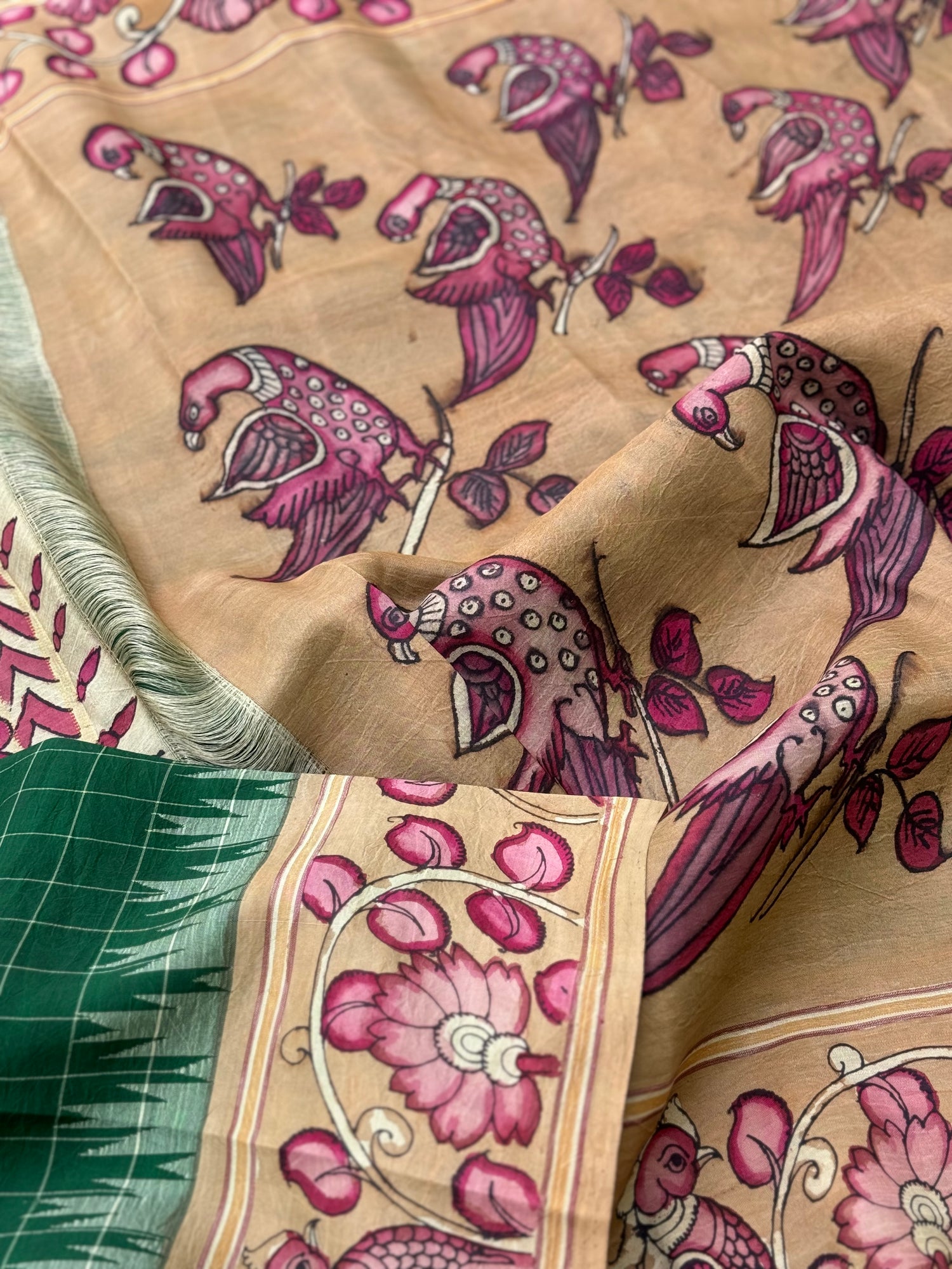 An elegant Handdrawn handpainted penkalamkari on Korvai kanchivaram silk saree withborder penkalamkari