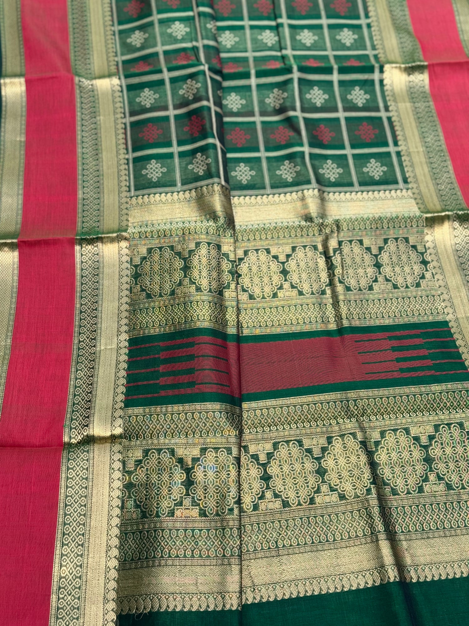 A gorgeous green shade handwoven kolam buttas  silk cotton saree