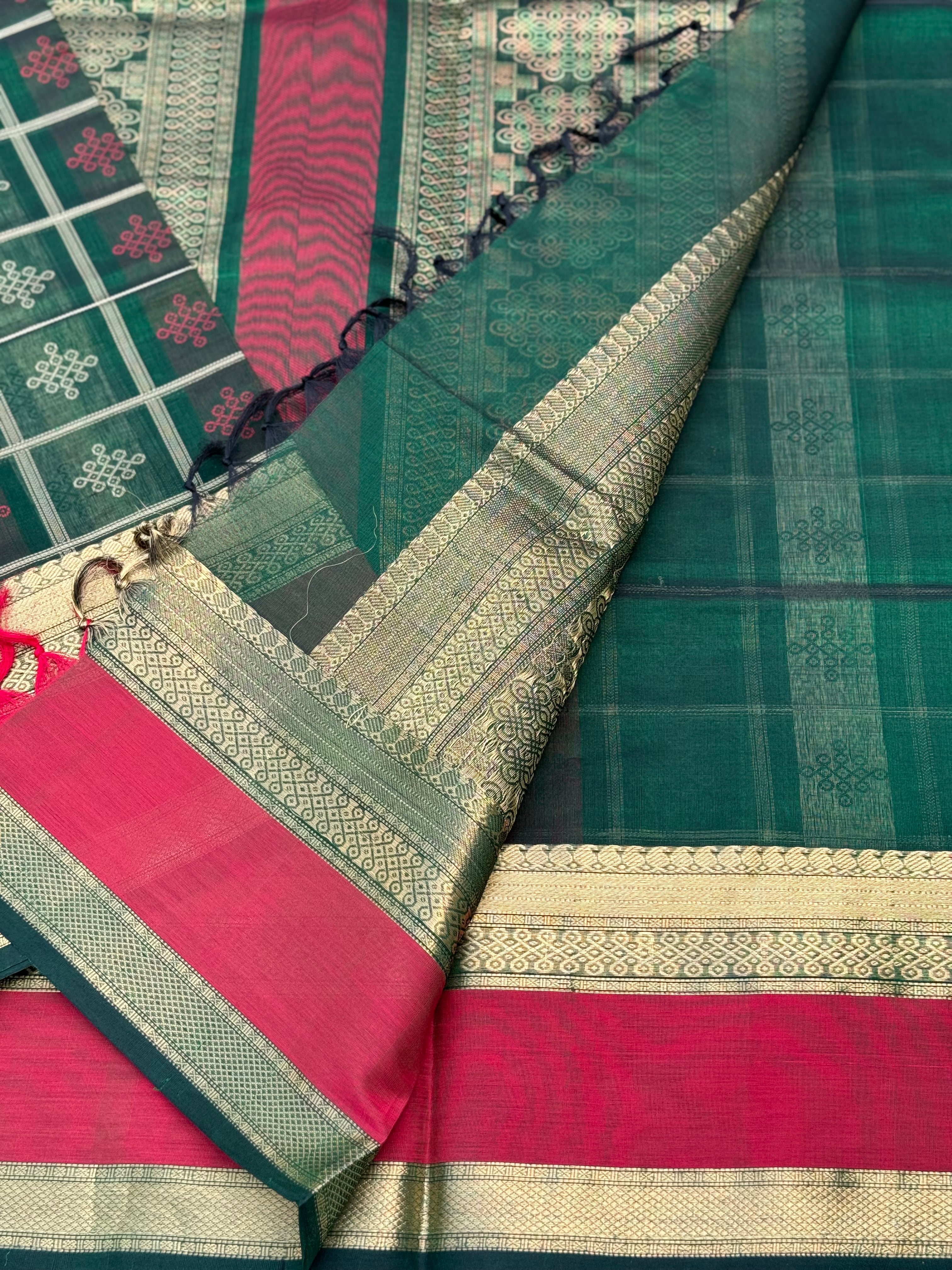 A gorgeous green shade handwoven kolam buttas  silk cotton saree