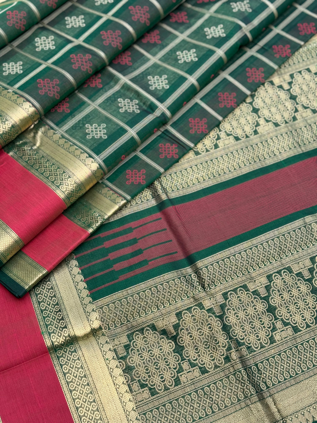 A gorgeous green shade handwoven kolam buttas silk cotton saree