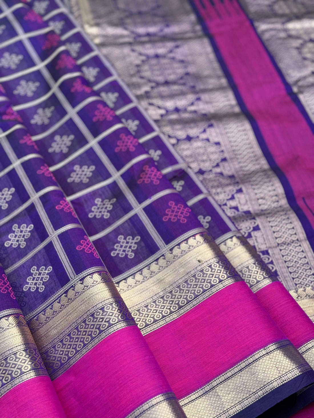 A gorgeous purple shade handwoven kolam buttas silk cotton saree