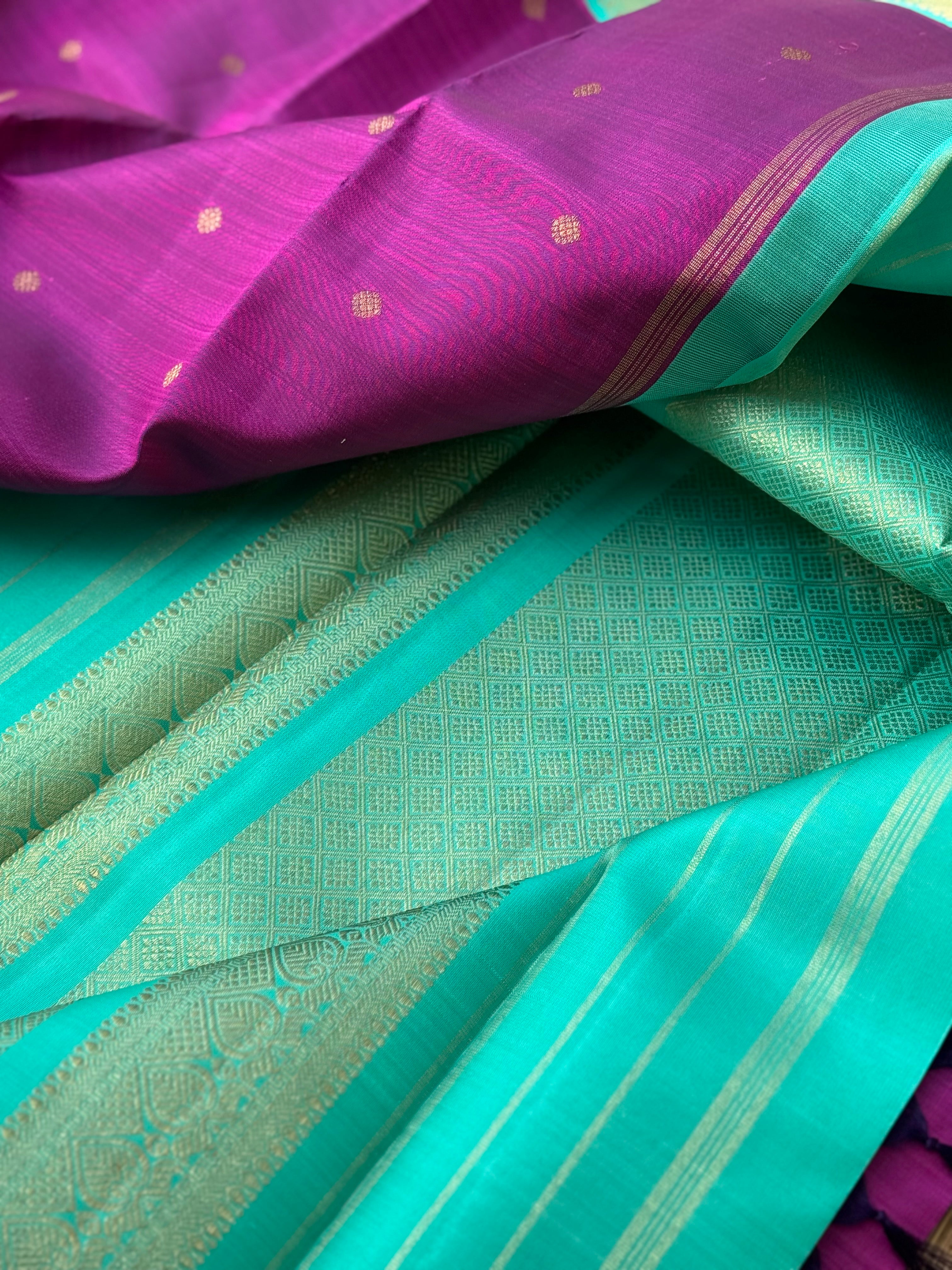 A Masterpiece kanchivaram korvai silk saree in deep plum pink with turquoise foam green