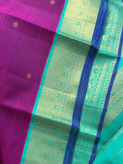 A Masterpiece kanchivaram korvai silk saree in deep plum pink with turquoise foam green