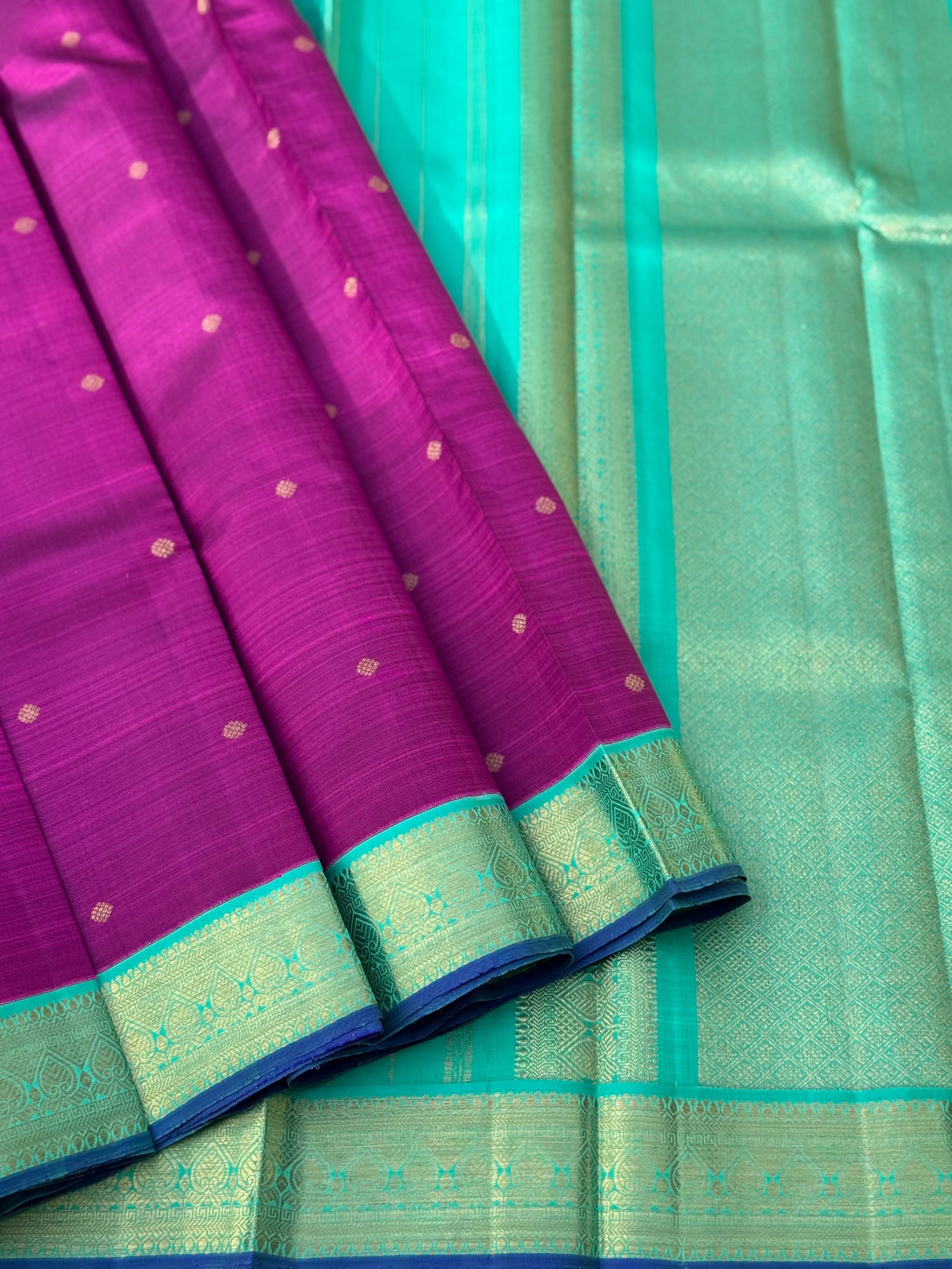 A Masterpiece kanchivaram korvai silk saree in deep plum pink with turquoise foam green