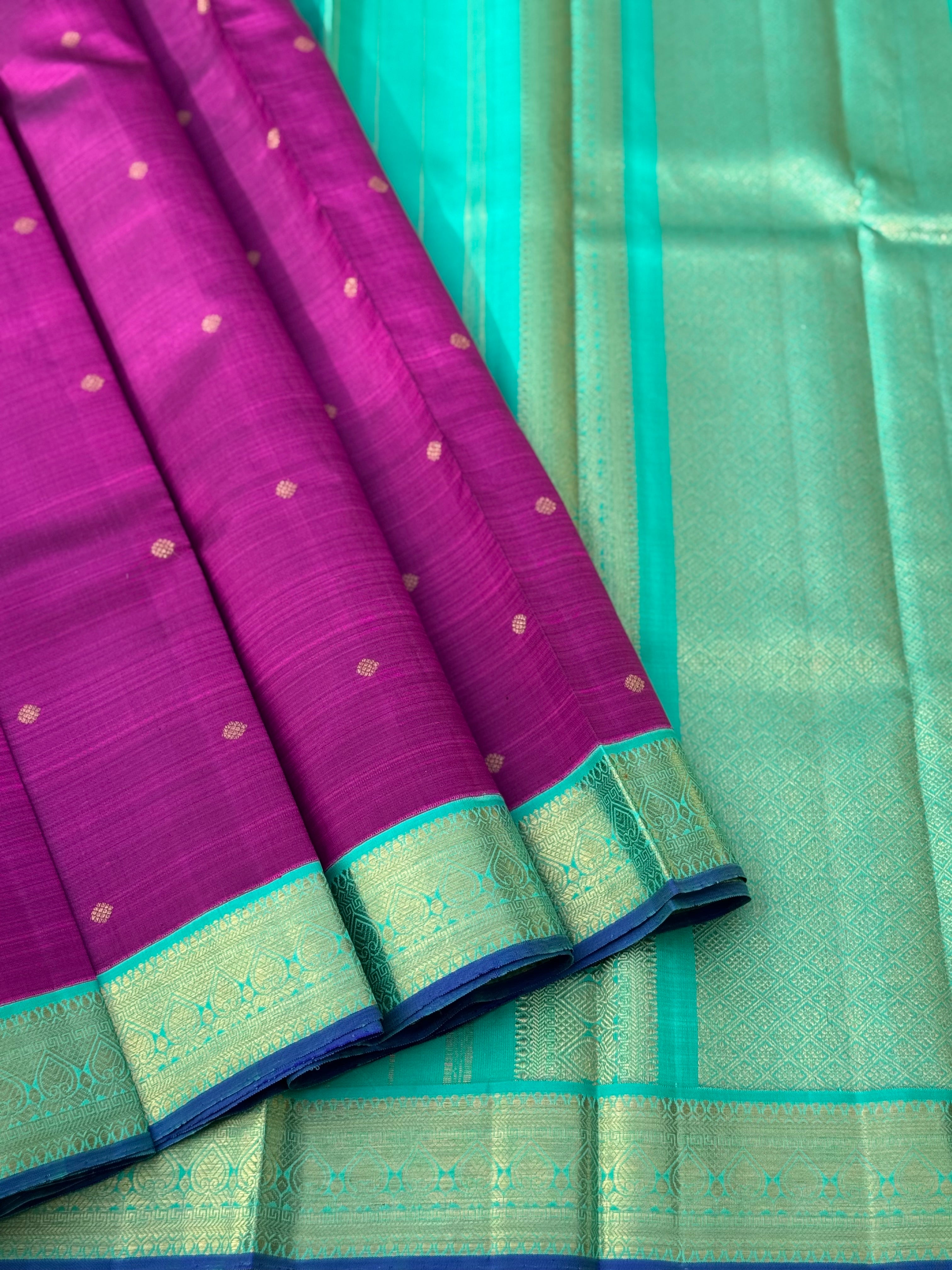 A Masterpiece kanchivaram korvai silk saree in deep plum pink with turquoise foam green