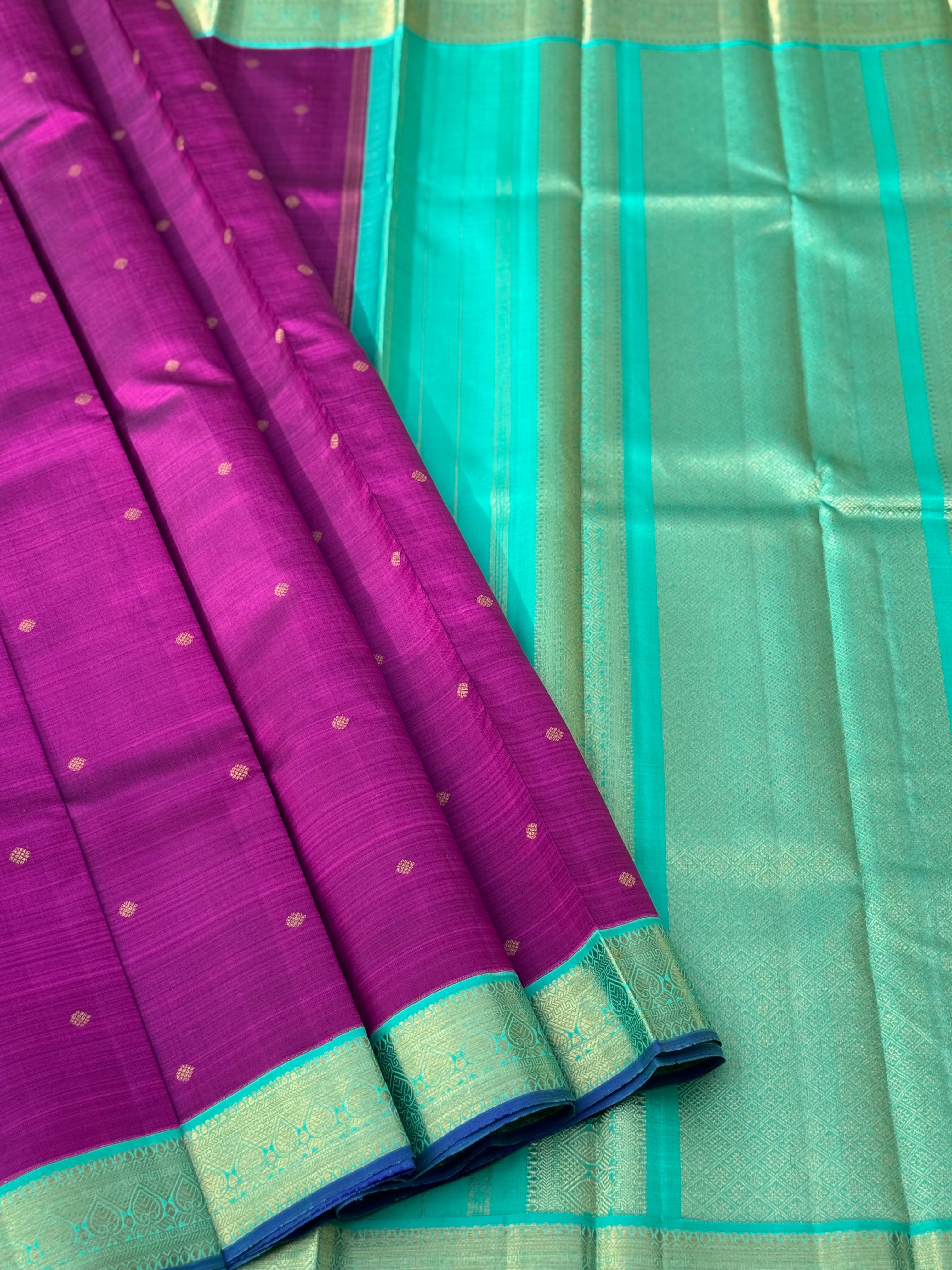A Masterpiece kanchivaram korvai silk saree in deep plum pink with turquoise foam green