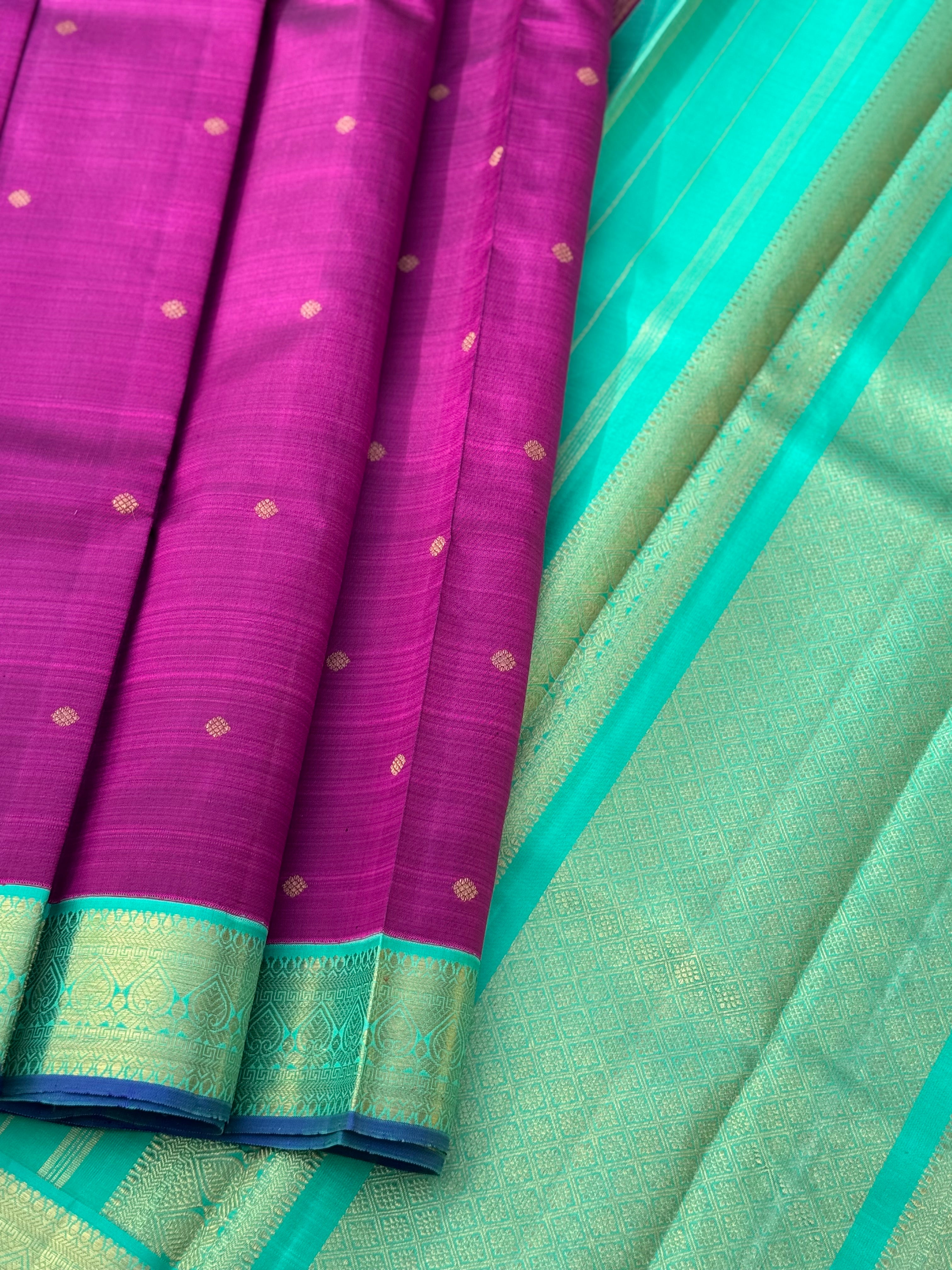 A Masterpiece kanchivaram korvai silk saree in deep plum pink with turquoise foam green