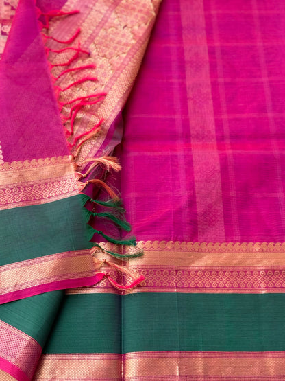 A gorgeous majenta shade handwoven kolam buttas  silk cotton saree