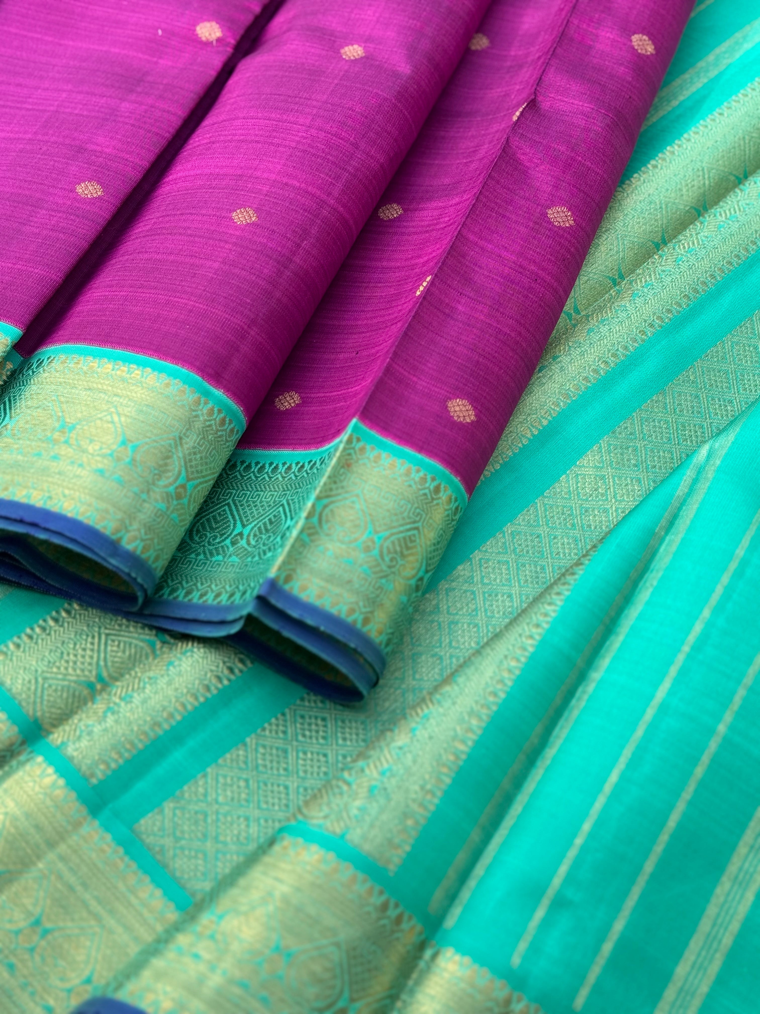 A Masterpiece kanchivaram korvai silk saree in deep plum pink with turquoise foam green