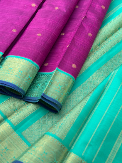 A Masterpiece kanchivaram korvai silk saree in deep plum pink with turquoise foam green