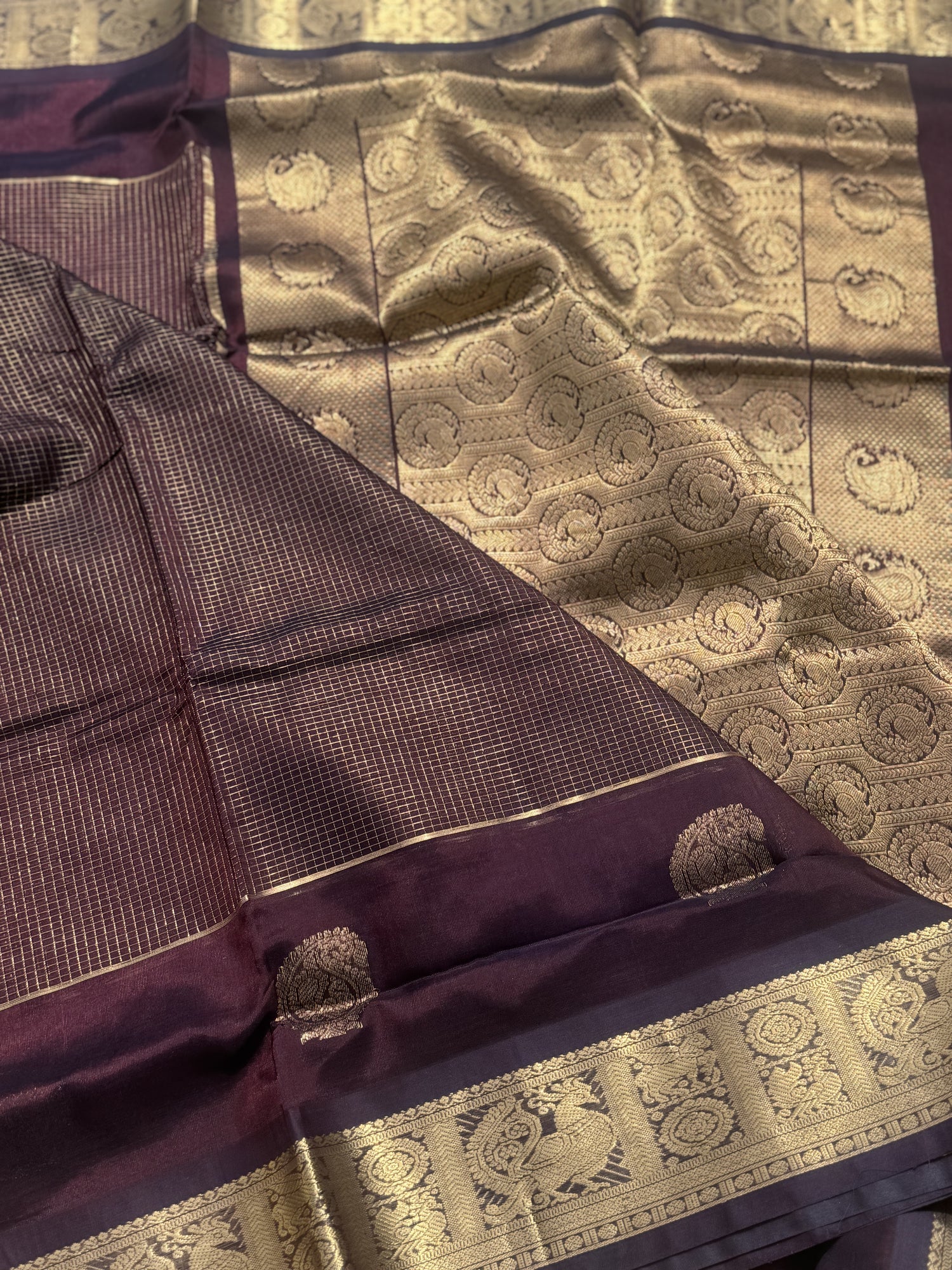 A gorgeous coffee brown zari checks weave handwoven kanchi silk cotton saree