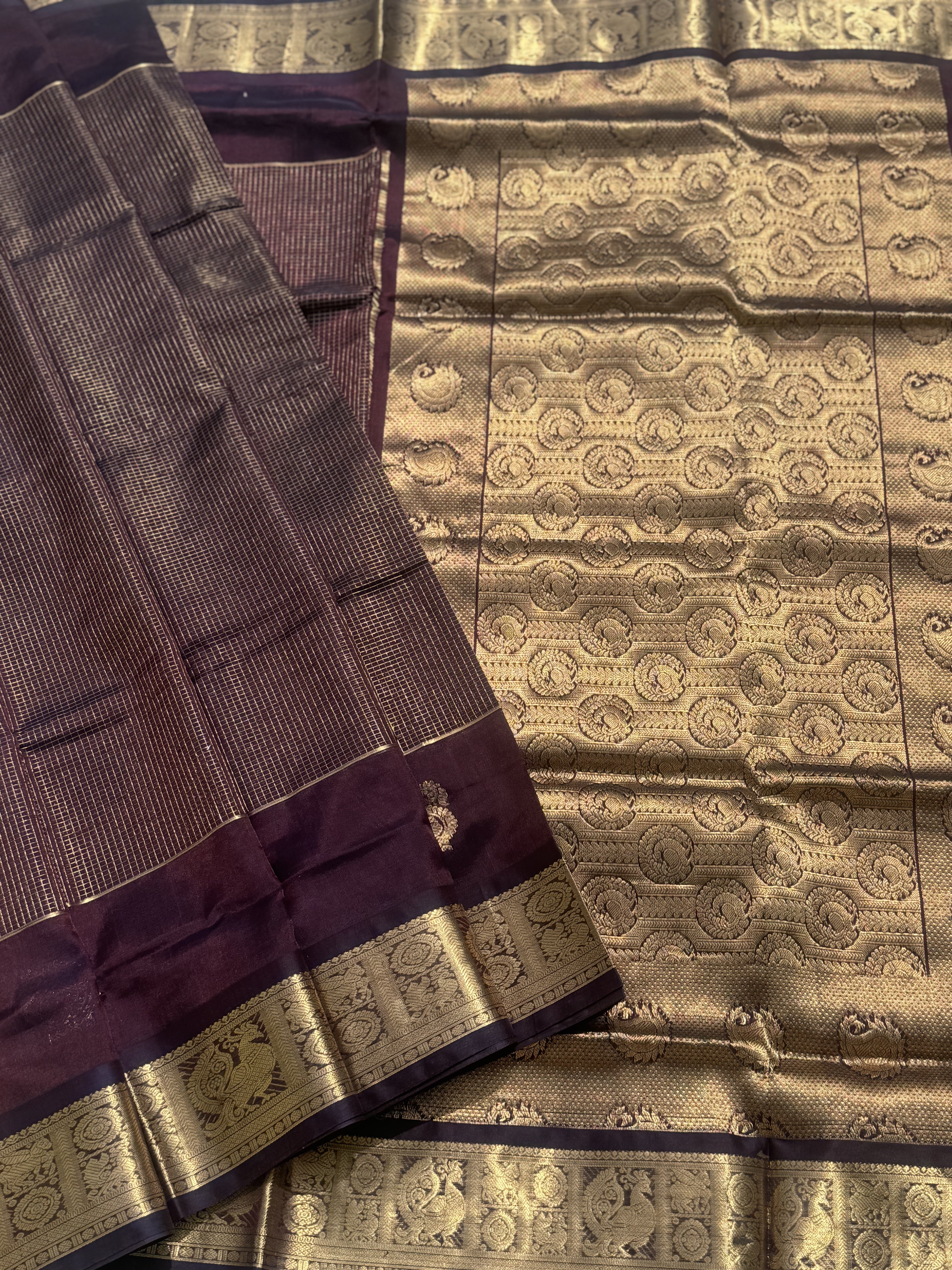 A gorgeous coffee brown zari checks weave handwoven kanchi silk cotton saree