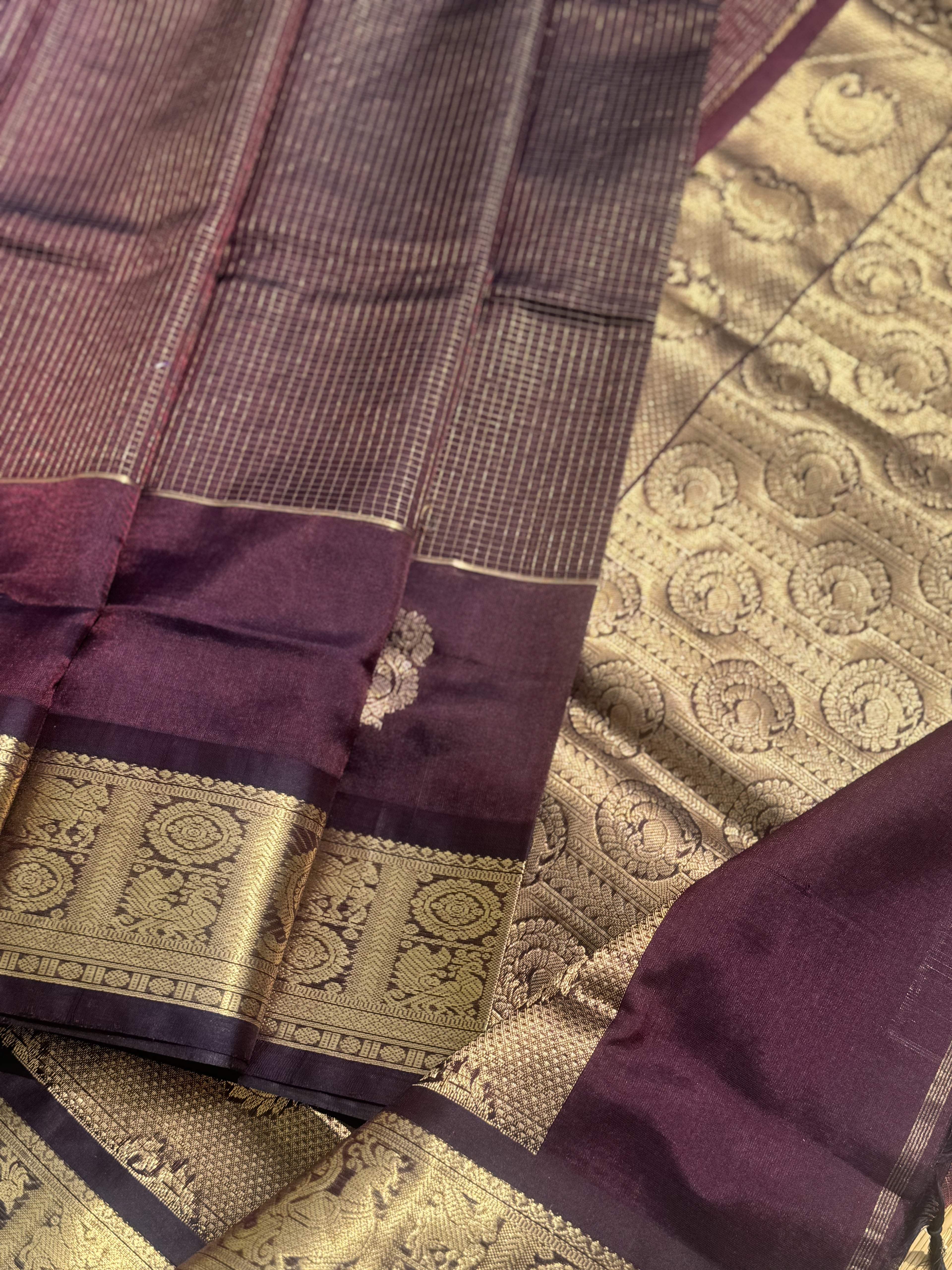 A gorgeous coffee brown zari checks weave handwoven kanchi silk cotton saree