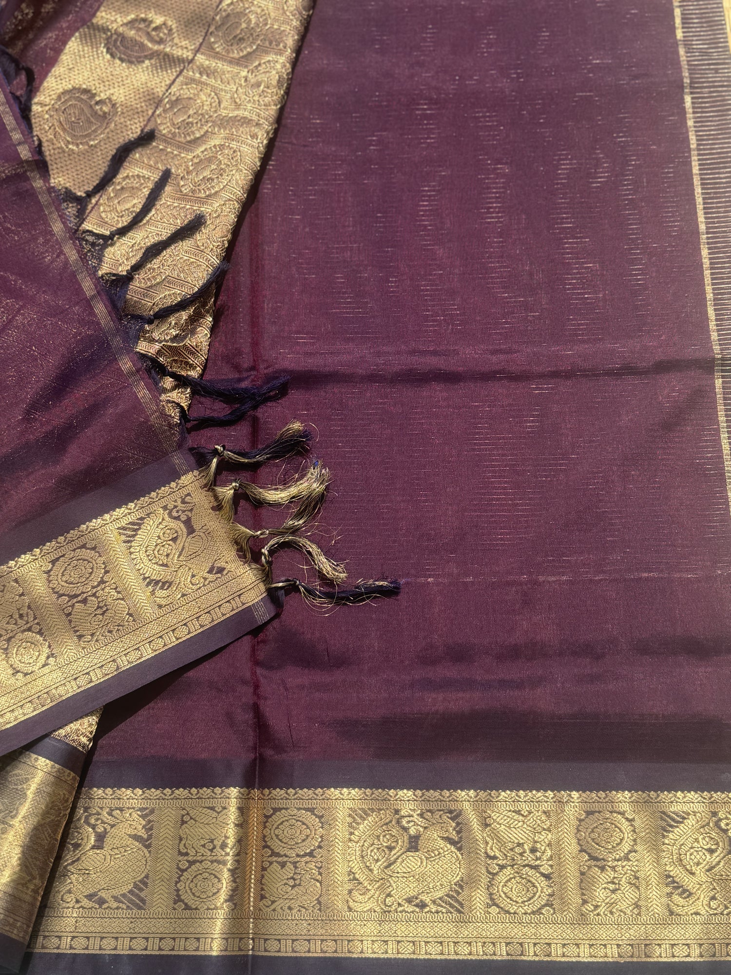 A gorgeous coffee brown zari checks weave handwoven kanchi silk cotton saree