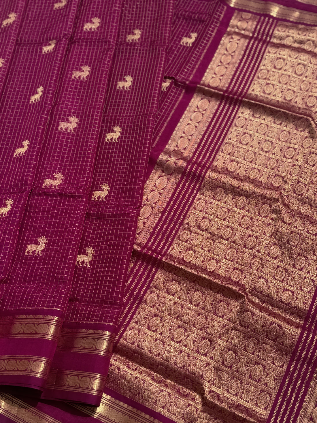 A gorgeous Plum pink zari checks weave with deer motifs handwoven kanchi silk cotton saree