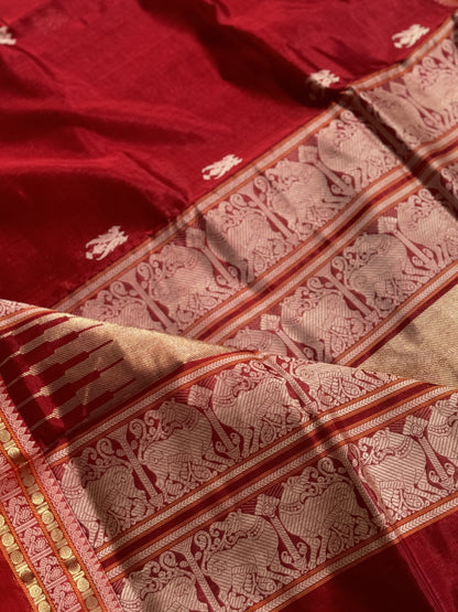 A gorgeous deep red handwoven twin parrots Kanchi silk cotton saree