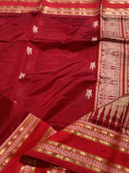 A gorgeous deep red handwoven twin parrots Kanchi silk cotton saree