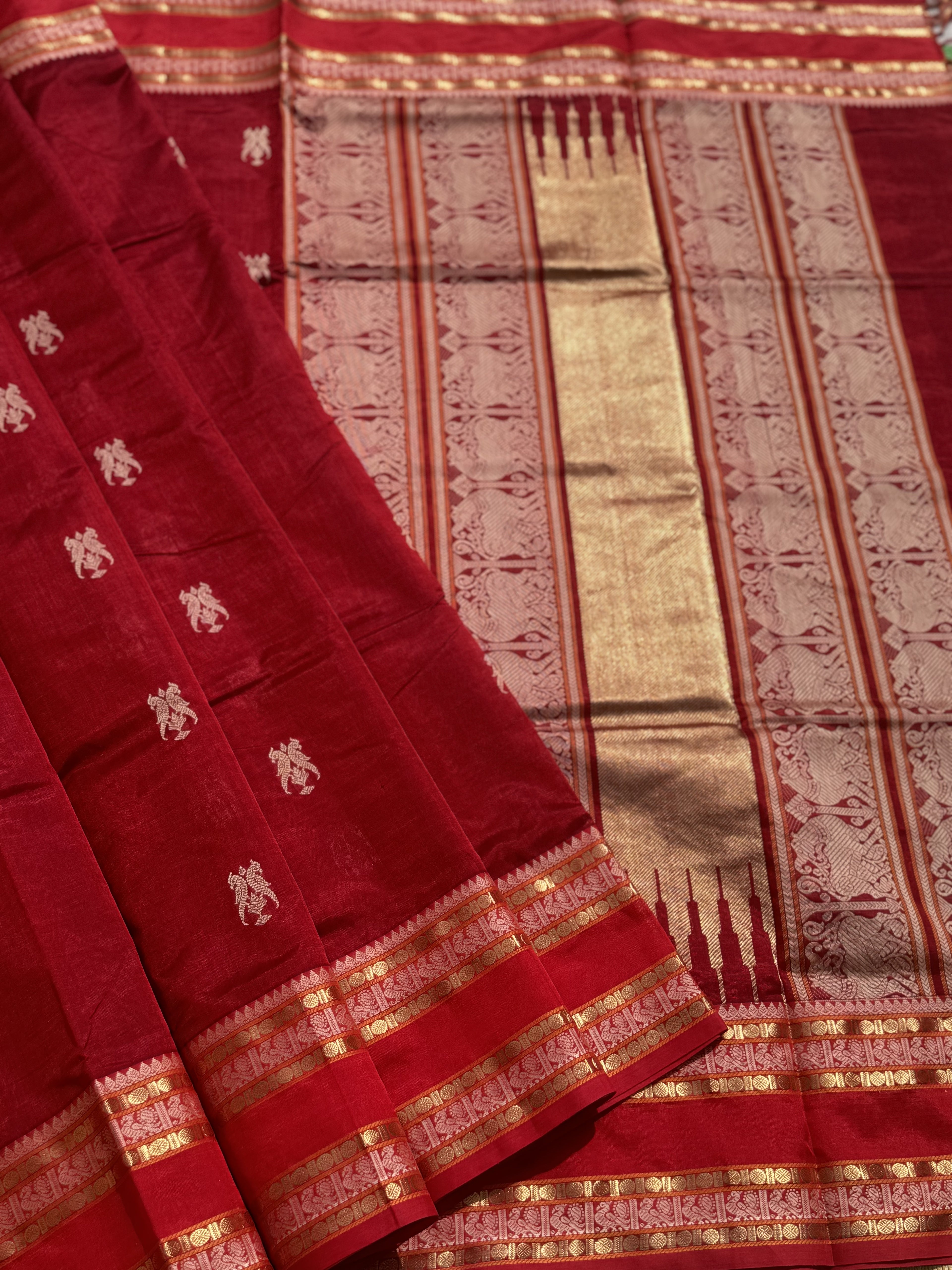 A gorgeous deep red handwoven twin parrots Kanchi silk cotton saree