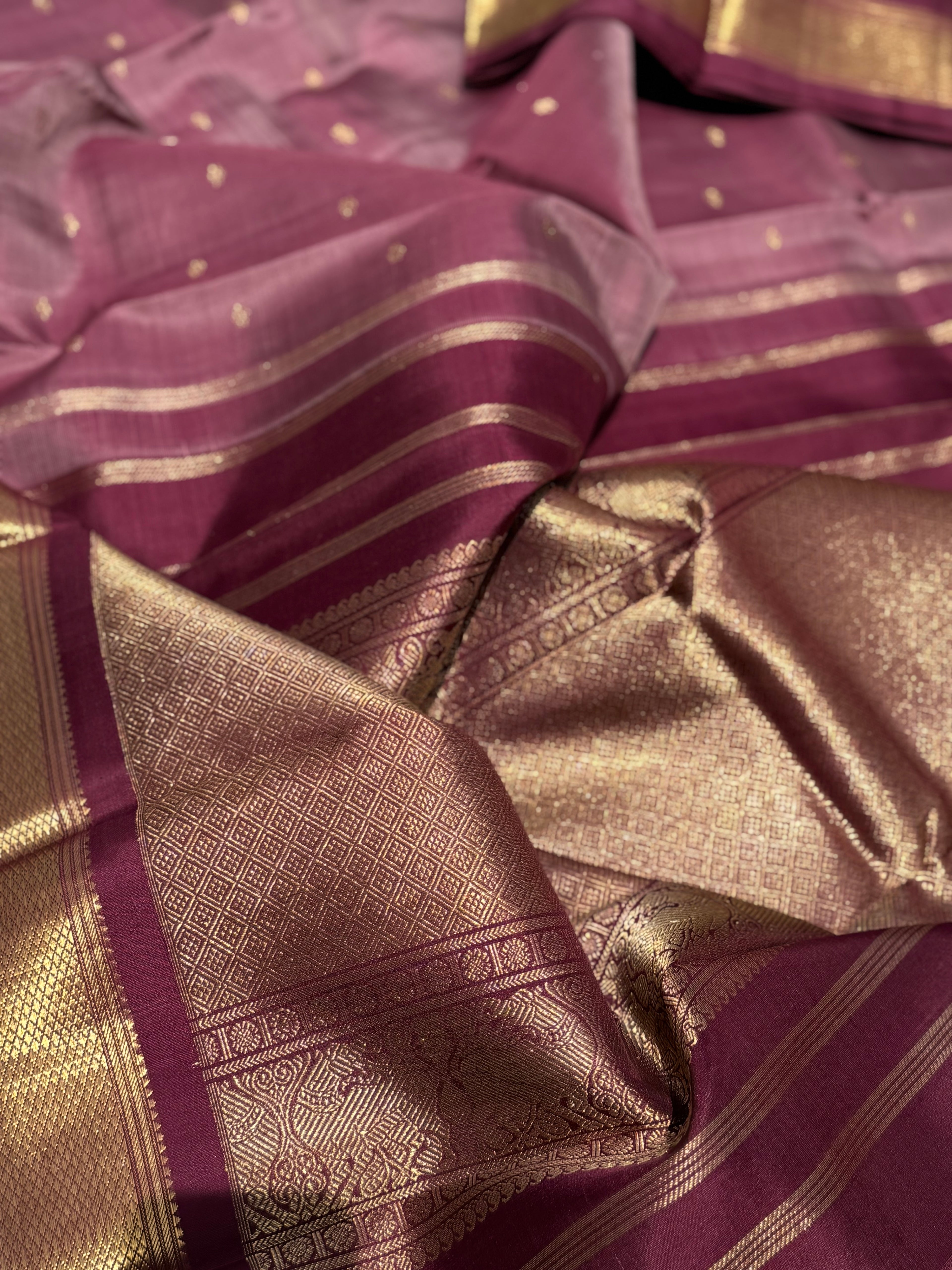 A classy vintage  masterpiece Kanchivaram silk saree in deep mauve brown