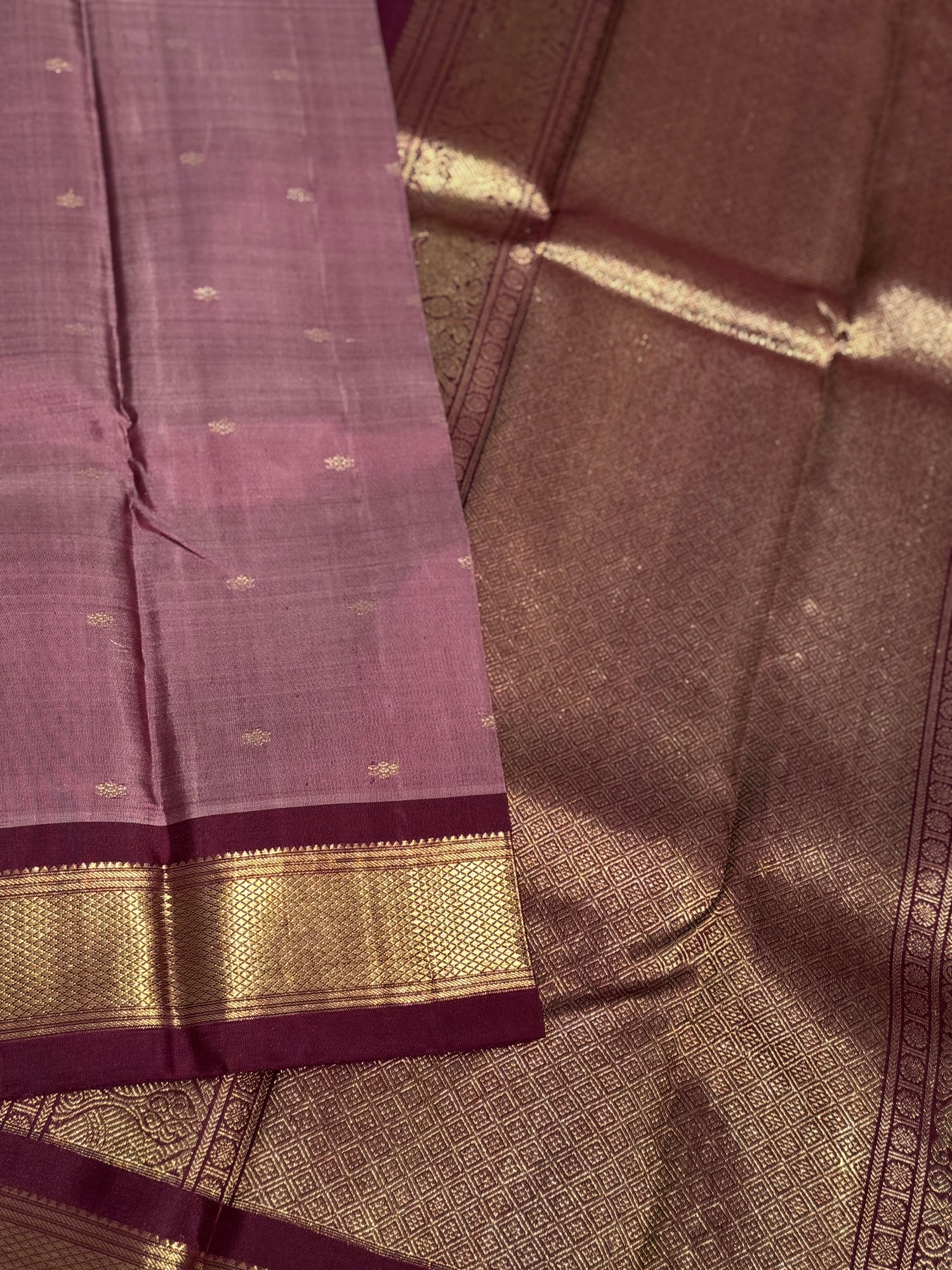 A classy vintage  masterpiece Kanchivaram silk saree in deep mauve brown