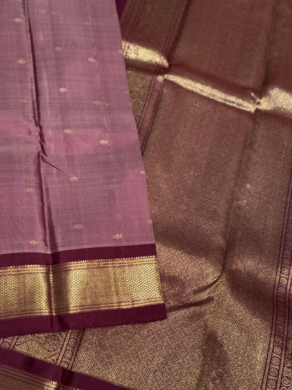 A classy vintage  masterpiece Kanchivaram silk saree in deep mauve brown