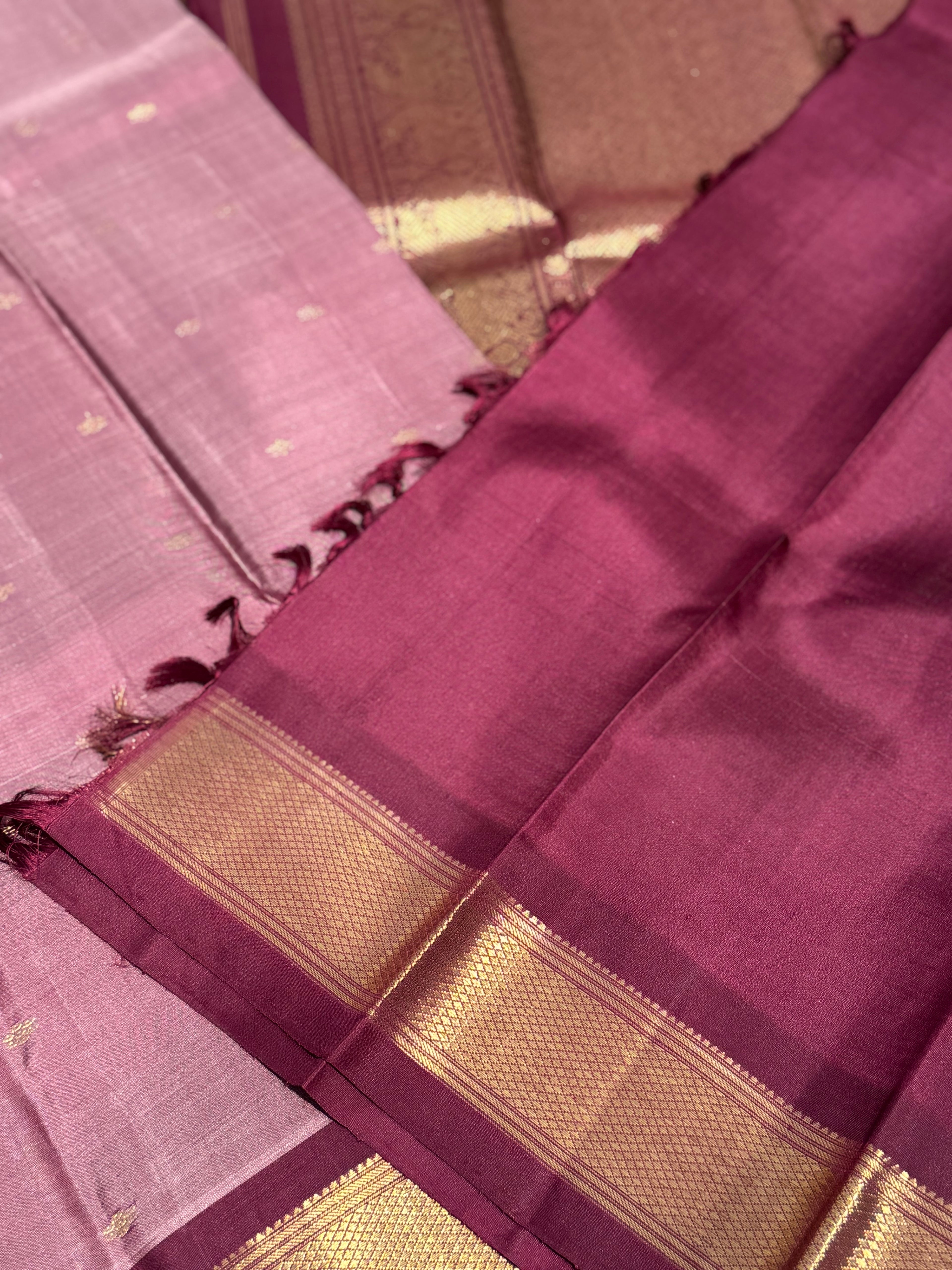 A classy vintage  masterpiece Kanchivaram silk saree in deep mauve brown