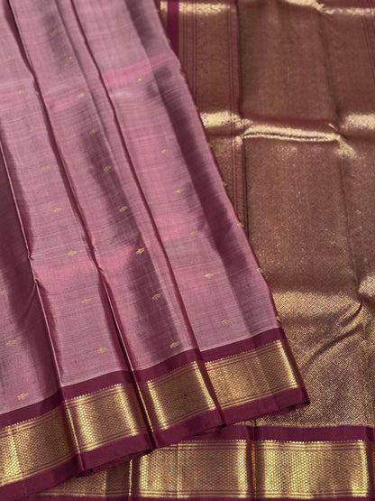 A classy vintage  masterpiece Kanchivaram silk saree in deep mauve brown