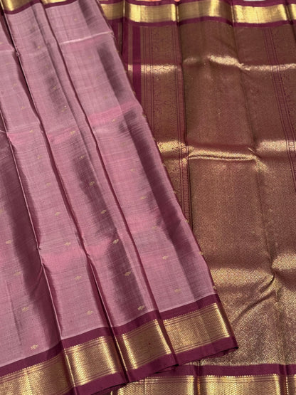 A classy vintage  masterpiece Kanchivaram silk saree in deep mauve brown