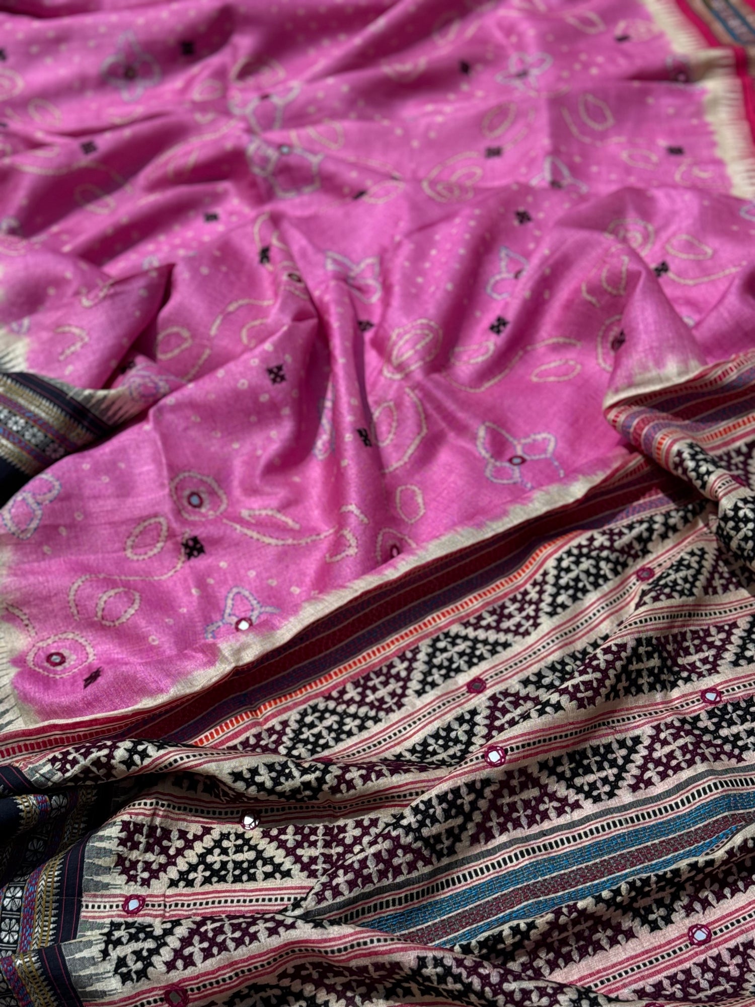 Masterpiece fusion work on handknotted bhandhej with handmade mirrorwork kutch embroidery on vidharbha tussar silk