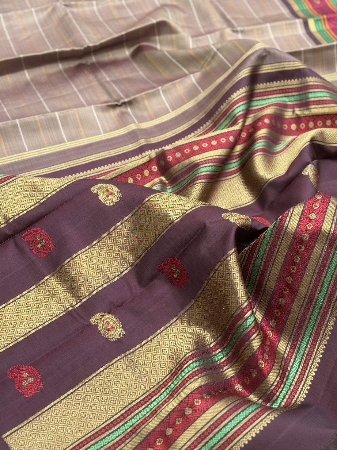A Masterpiece neli veldhari kanchivaram korvai silk saree in a gorgeous molten gold shade