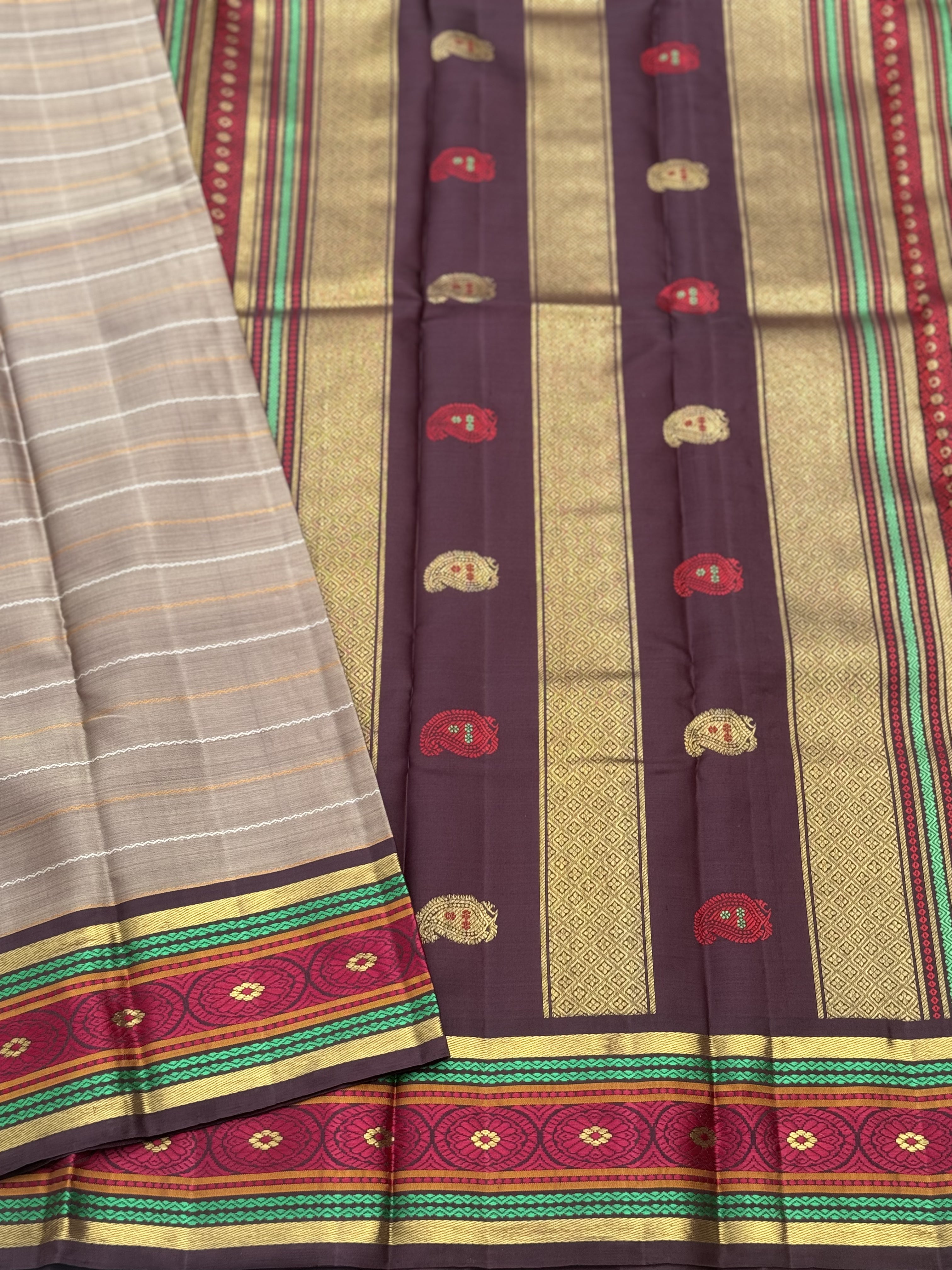 A Masterpiece neli veldhari kanchivaram korvai silk saree in a gorgeous molten gold shade