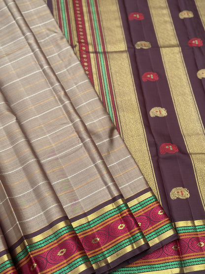 A Masterpiece neli veldhari kanchivaram korvai silk saree in a gorgeous molten gold shade