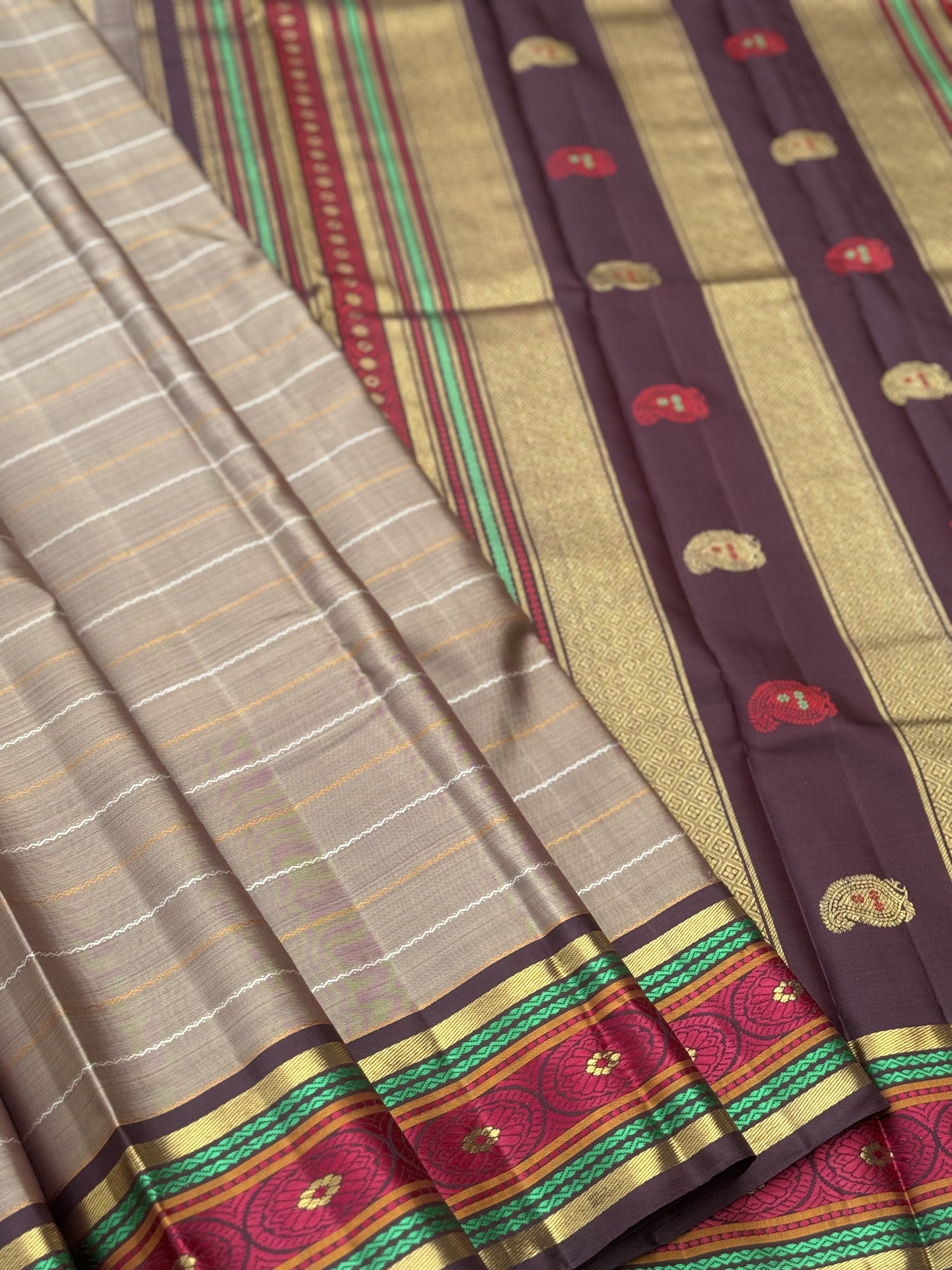 A Masterpiece neli veldhari kanchivaram korvai silk saree in a gorgeous molten gold shade
