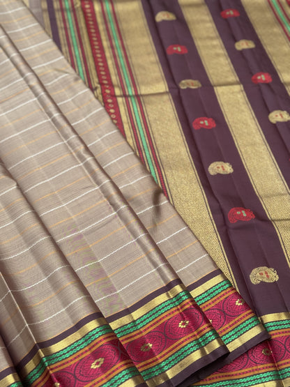 A Masterpiece neli veldhari kanchivaram korvai silk saree in a gorgeous molten gold shade