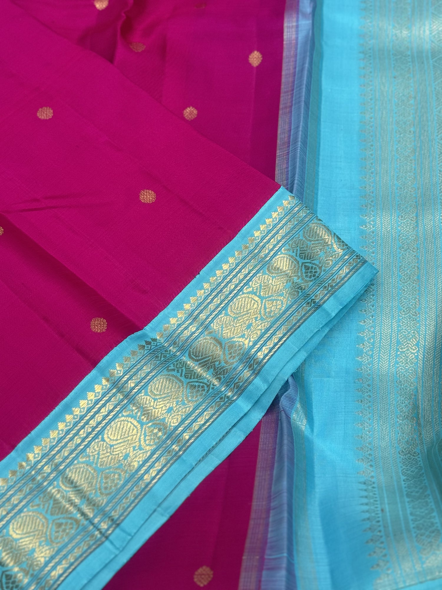 A Masterpiece kanchivaram korvai silk saree in deep amaranth pink with seablue