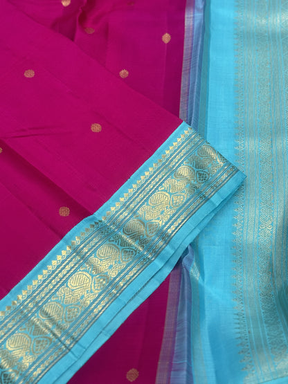 A Masterpiece kanchivaram korvai silk saree in deep amaranth pink with seablue