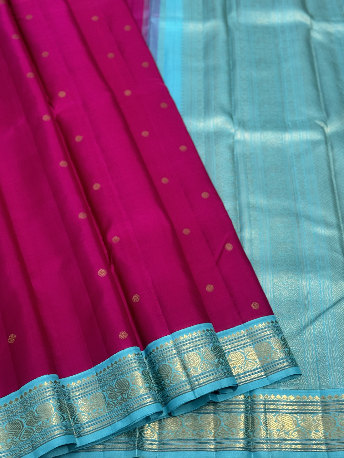 A Masterpiece kanchivaram korvai silk saree in deep amaranth pink with seablue