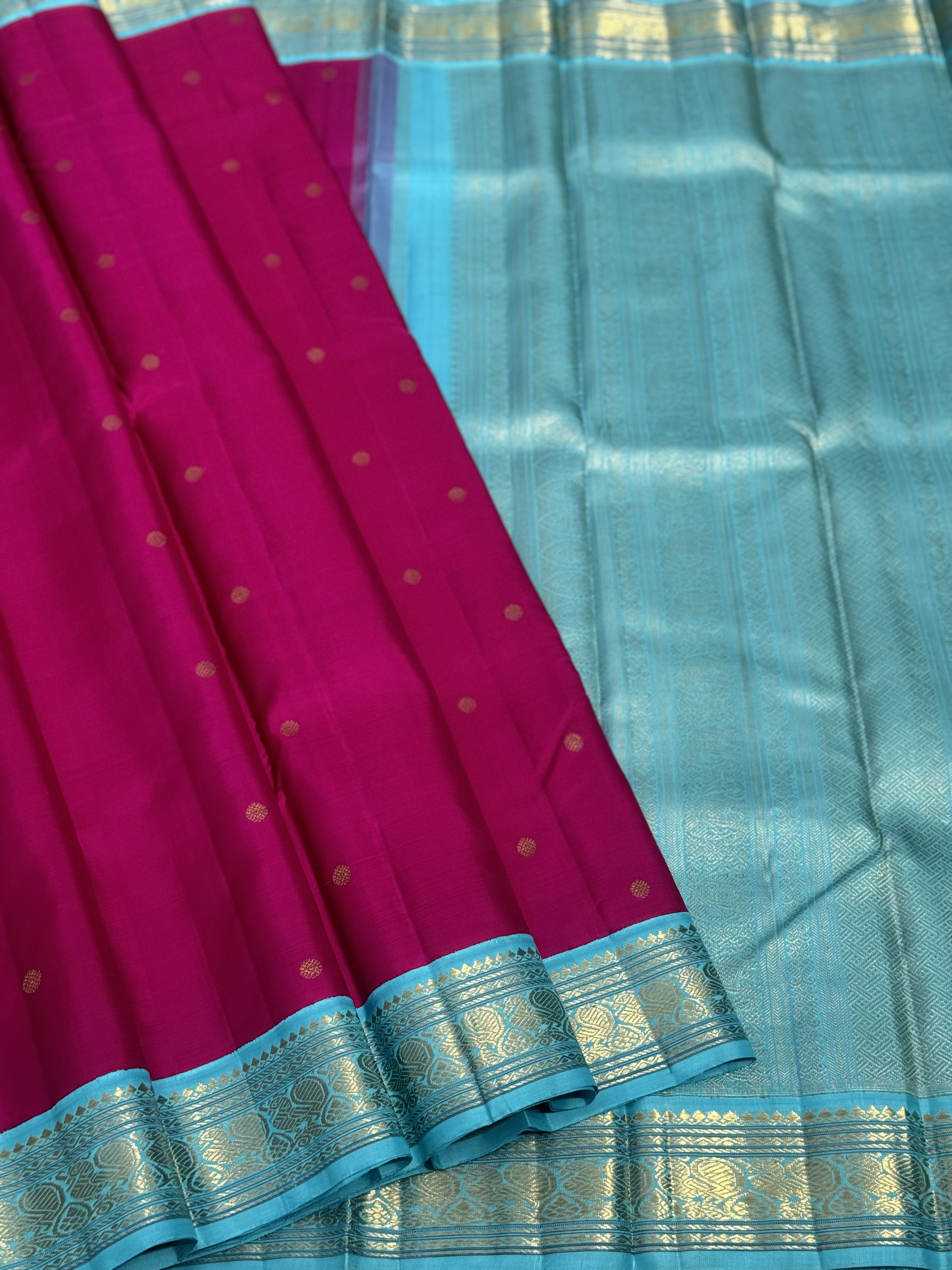 A Masterpiece kanchivaram korvai silk saree in deep amaranth pink with seablue