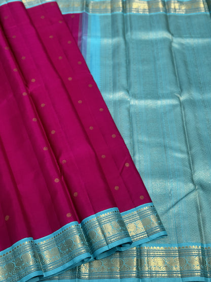 A Masterpiece kanchivaram korvai silk saree in deep amaranth pink with seablue